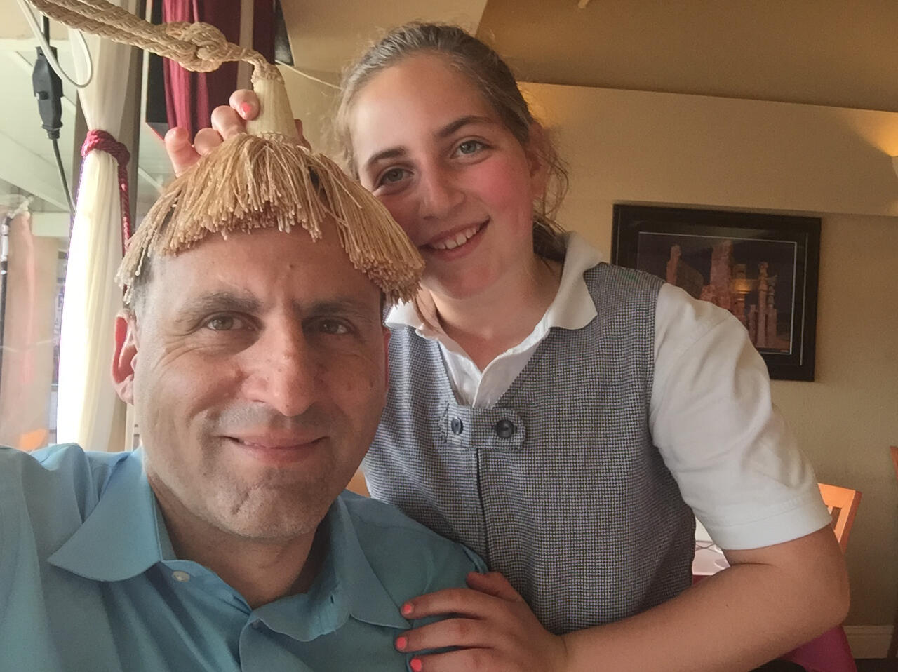 Emily Mitnick in Persian restaurant after school. We ar eplaying with curtains and having fun