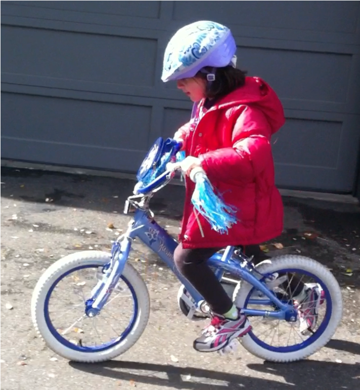 Emily Mitnick speeding up on a beautiful bike