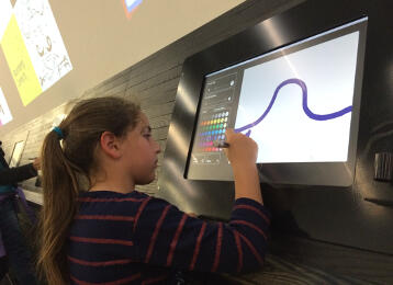 Emily Mitnick in the Museum of modern art exploring new painting media.