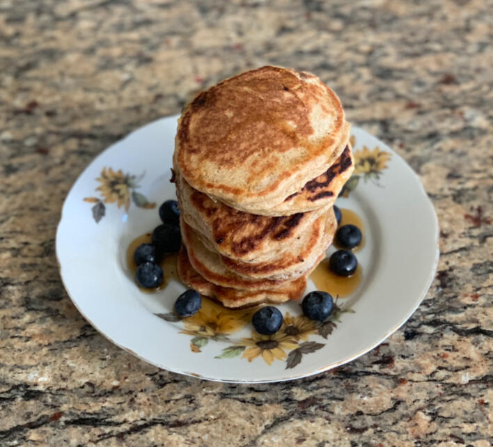 Emily Mitnick masterfully presented pancakes with blueberry and honey.
