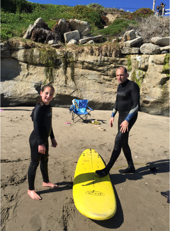 Emily Judith Mitnick on the beach under the sun.