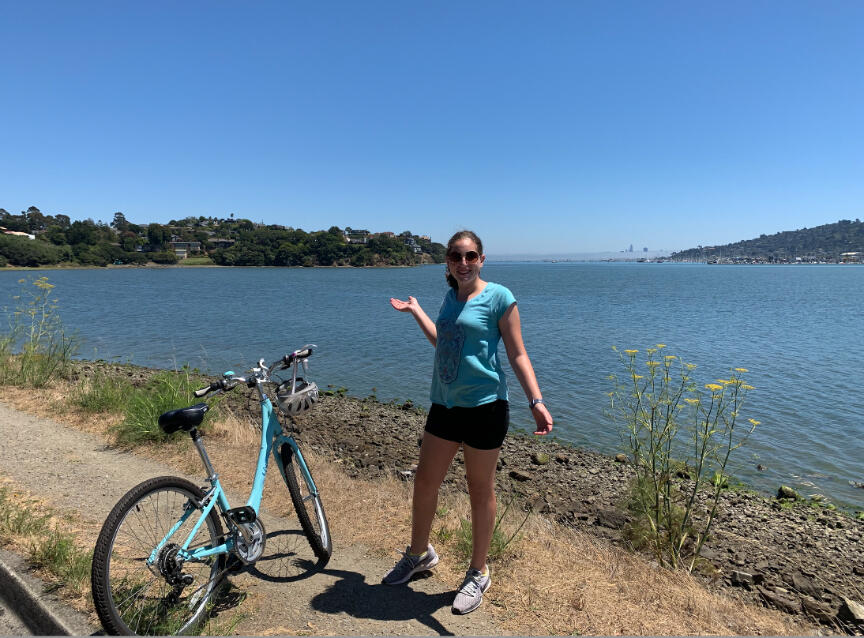 Emily Judith Mitnick at a biking trip with the most beautiful scenery of the ocean.
