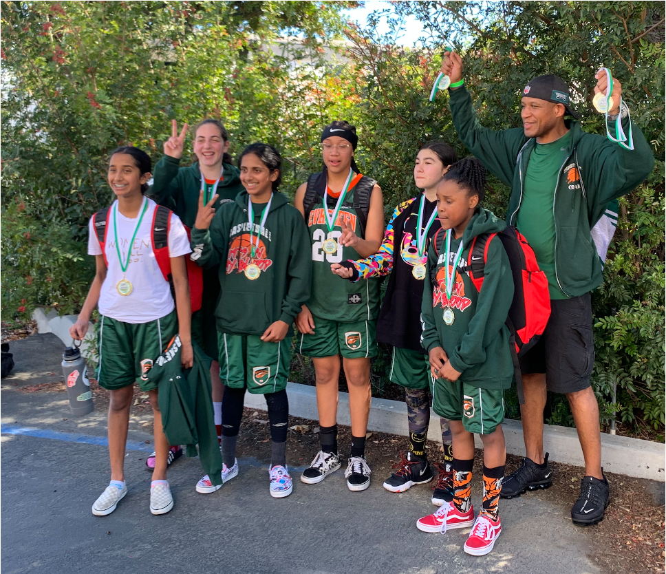 Emily Mitnick with her basketball team after getting the medals in competition.