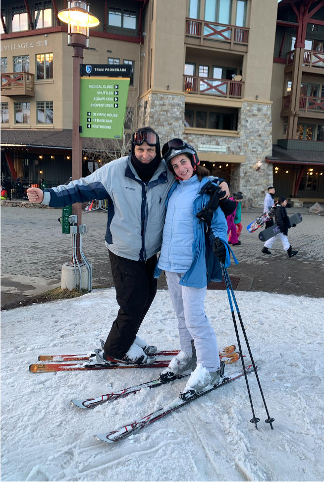 Emily Mitnick at the end of full day of skiing, looking happy.